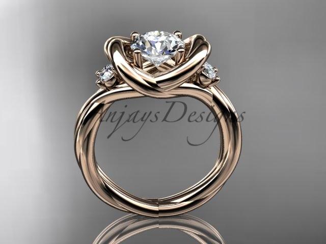 14kt rose gold twisted rope three stone engagement ring with a "Forever One" Moissanite RP8146