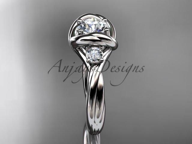 14kt white gold twisted rope three stone engagement ring with a "Forever One" Moissanite RP8146
