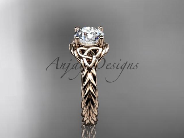 14kt rose gold rope triquetra celtic engagement ring with a "Forever One" Moissanite center stone RPCT9112