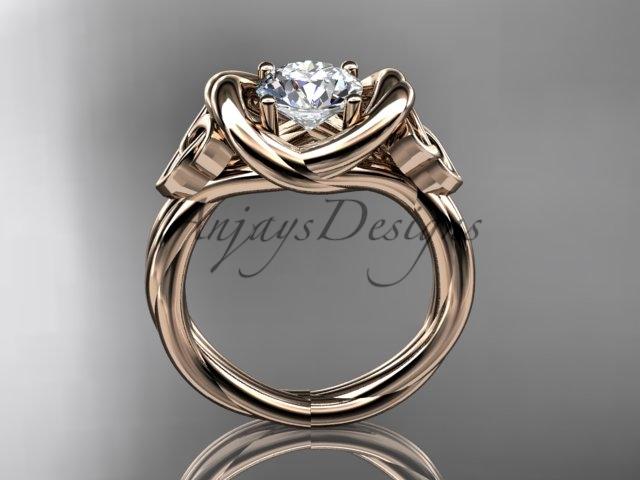 14kt rose gold trinity celtic twisted rope wedding ring with a "Forever One" Moissanite center stone RPCT9146