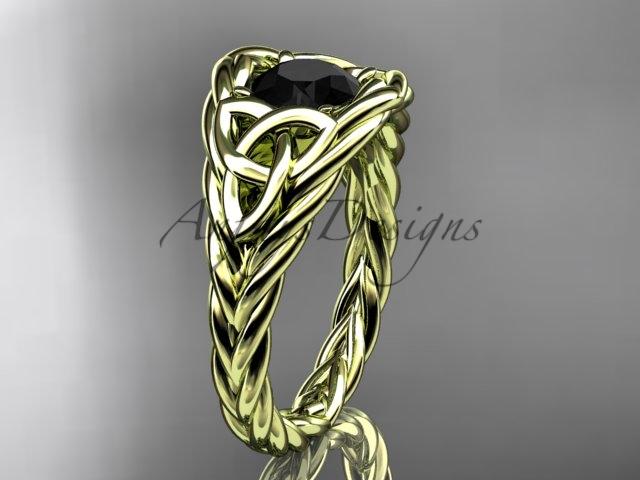 14kt yellow gold celtic trinity rope wedding ring with a Black Diamond center stone RPCT964