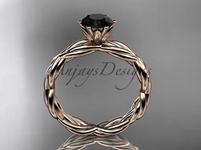 14kt rose gold rope engagement ring with a Black Diamond center stone RP8101