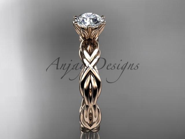 14kt rose gold rope engagement ring with a "Forever One" Moissanite center stone RP8101
