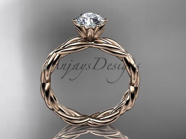 14kt rose gold rope engagement ring with a "Forever One" Moissanite center stone RP8101