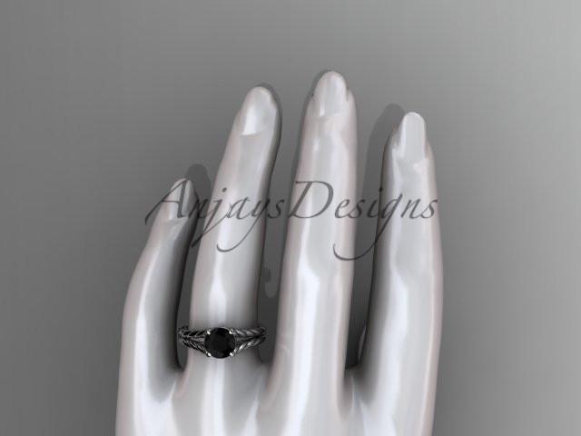 14kt white gold twisted rope engagement ring with a Black Diamond center stone RP8108
