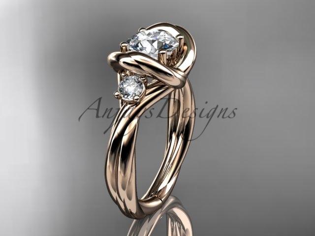 14kt rose gold twisted rope three stone engagement ring with a "Forever One" Moissanite RP8146