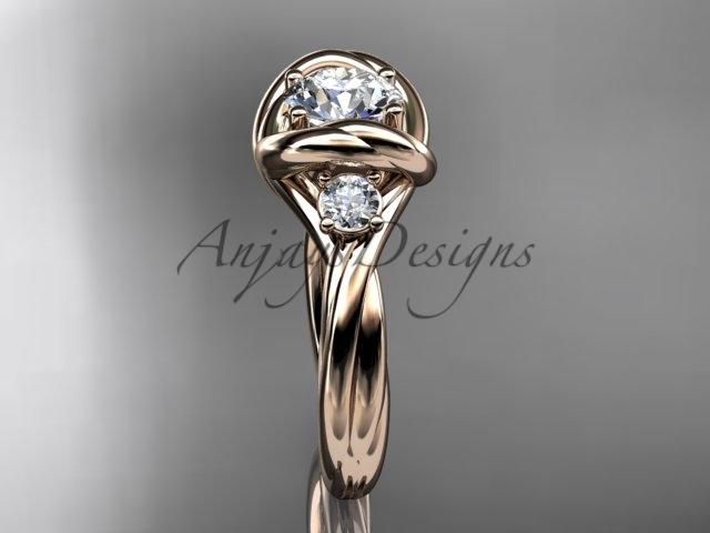 14kt rose gold twisted rope three stone engagement ring with a "Forever One" Moissanite RP8146