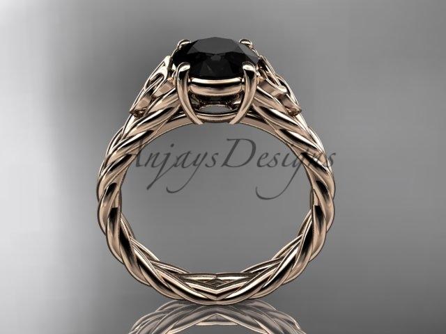 14kt rose gold celtic rope engagement ring with a Black Diamond center stone RPCT9108