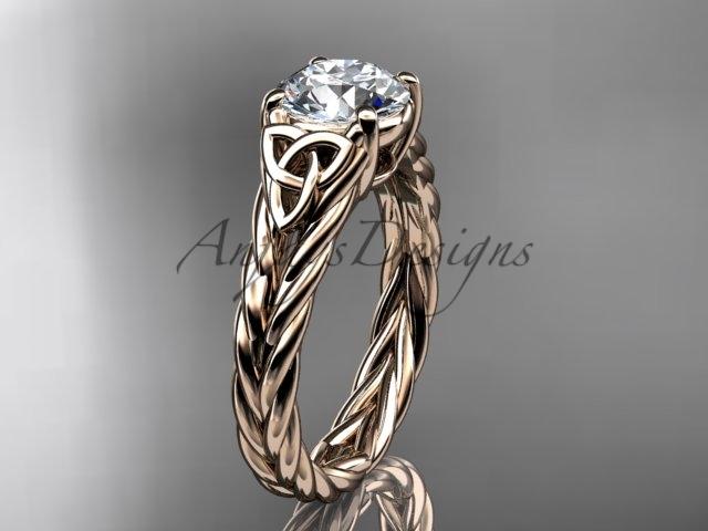 14kt rose gold celtic rope engagement ring with a "Forever One" Moissanite center stone RPCT9108