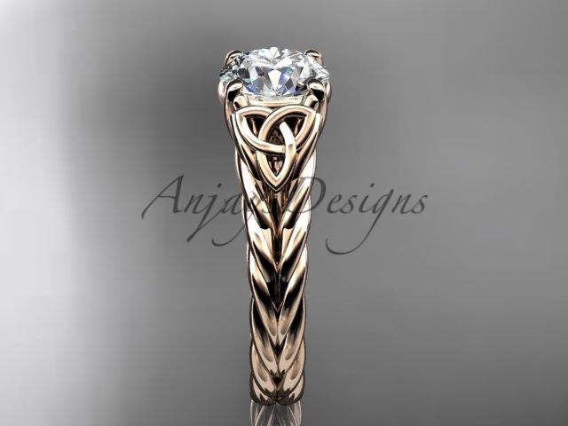 14kt rose gold celtic rope engagement ring with a "Forever One" Moissanite center stone RPCT9108