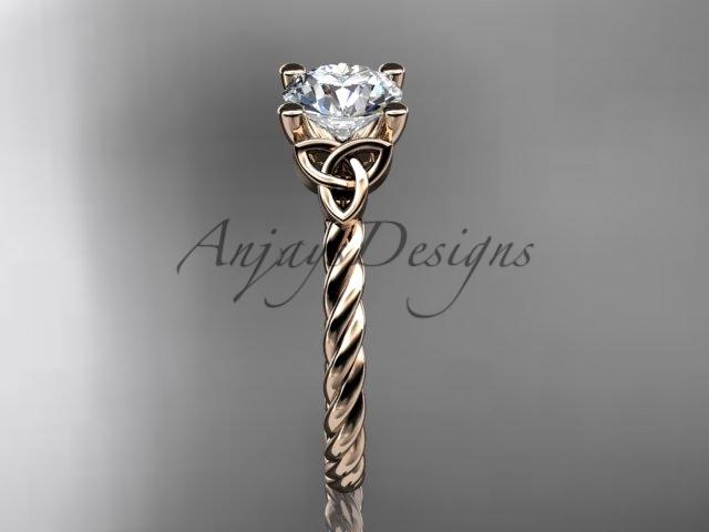 14kt rose gold rope triquetra celtic engagement ring with a "Forever One" Moissanite center stone RPCT9116