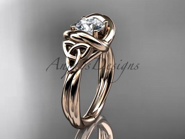 14kt rose gold trinity celtic twisted rope wedding ring with a "Forever One" Moissanite center stone RPCT9146
