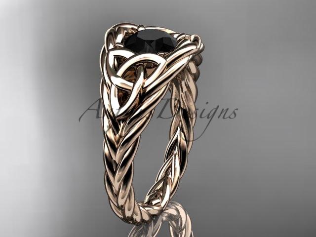 14kt rose gold celtic trinity rope wedding ring with a Black Diamond center stone RPCT964