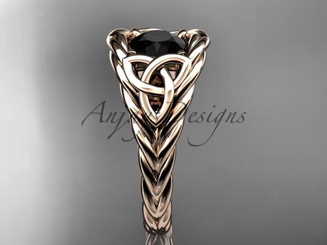 14kt rose gold celtic trinity rope wedding ring with a Black Diamond center stone RPCT964