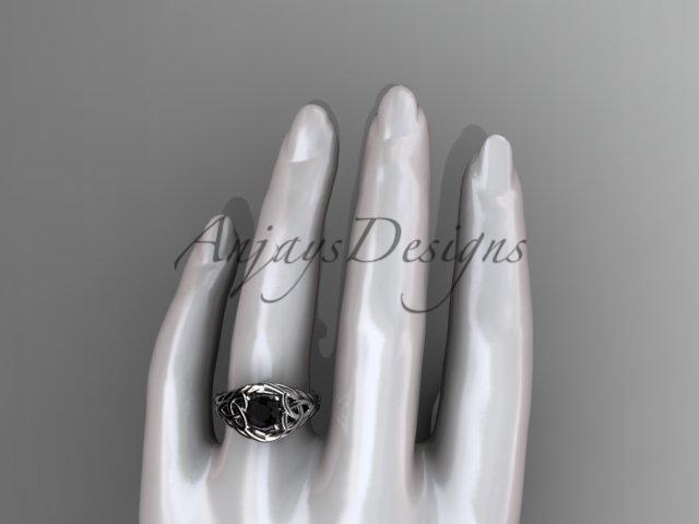 Platinum celtic trinity rope wedding ring with a Black Diamond center stone RPCT964